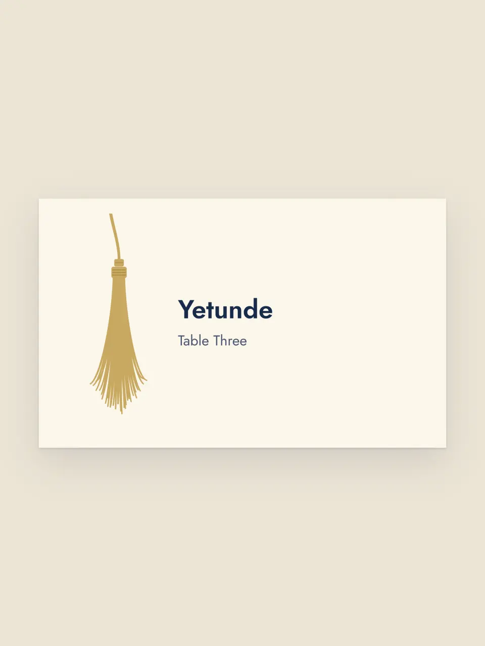 Graduation dinner place card lettered with an individual guest's name